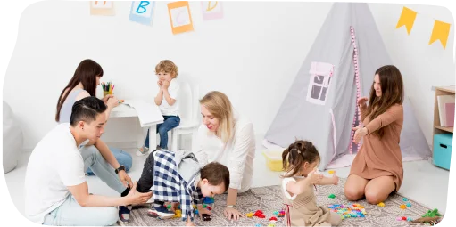 Children engaging in active learning activities with teachers at Step By Step Nursery in Jumeirah, fostering creativity and hands-on exploration.